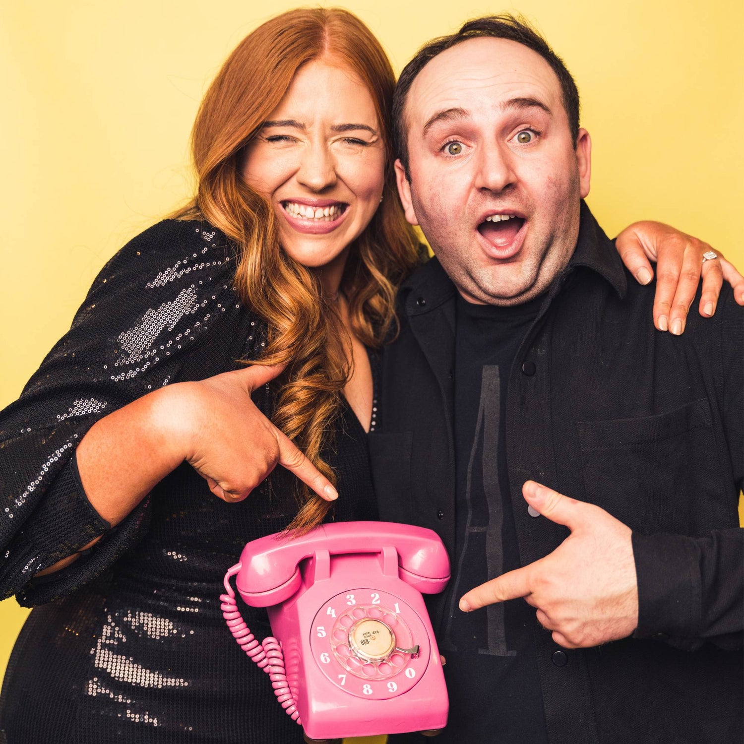 suzy and mark with a pink phone